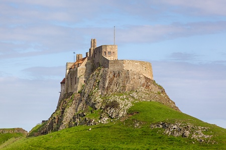 Lindisfarne Castle is a 16th-century castle located on Holy Island, near Berwick-upon-Tweed, Northumberland, England のeditorial素材