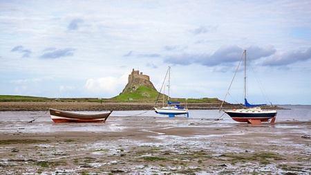 Lindisfarne Castle is a 16th-century castle located on Holy Island, near Berwick-upon-Tweed, Northumberland, England のeditorial素材
