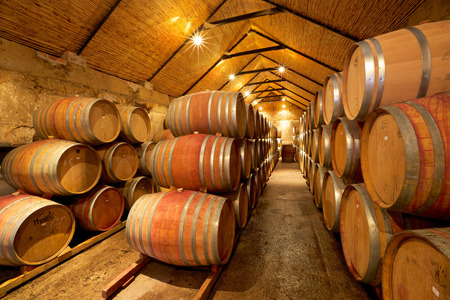 PAARL, SOUTH AFRICA - APRIL 19, 2012  Wine maturing in French oak barrels in the wine cellar at Vondeling Wines in the Paarl Wine Region of South Africa  のeditorial素材