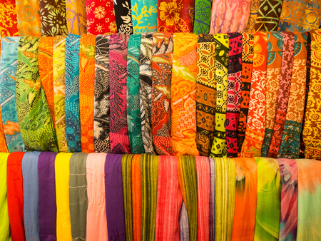 Colorful sarongs on sale in the market at Ubud in Bali, Indonesia.