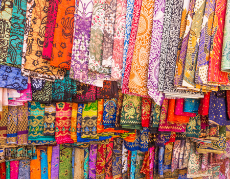 Colorful sarongs on sale in the market at Ubud in Bali, Indonesia.の写真素材