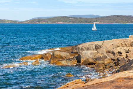 A yacht sailing off King Point in Albany in Western Australia.の写真素材