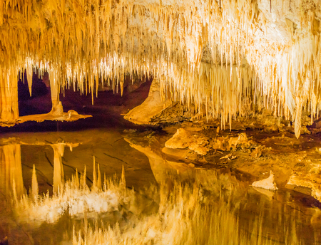LAKE CAVE, WESTERN AUSTRALIA - JULY 7, 2017: The lake in Lake Cave, near the town of Margaret River in Western Australia, with its beautiful 'suspended table', stalactites and crystal formationsのeditorial素材