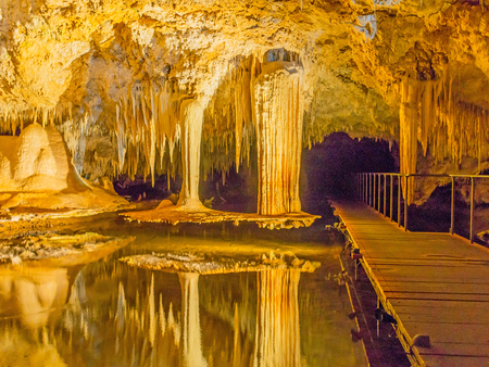 LAKE CAVE, WESTERN AUSTRALIA - JULY 7, 2017: The beautiful 'Suspended Table', stalactites and crystal formations in Lake Cave, near the town of Margaret River in Western Australia.のeditorial素材