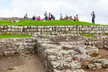NORTHUMBERLAND, ENGLAND - JULY 7, 2012: The remains of Housesteads Roman Fort, part of Hadrian's Wall in Northumberland, England.のeditorial素材