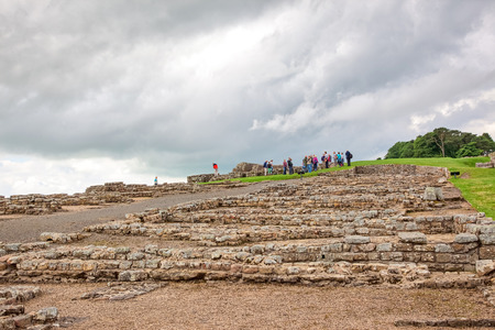 NORTHUMBERLAND, ENGLAND - JULY 7, 2012: The remains of Housesteads Roman Fort, part of Hadrian's Wall in Northumberland, England.のeditorial素材