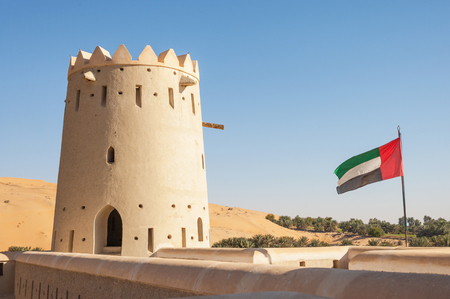 LIWA, UAE - FEBRUARY 15, 2008: The ramparts of a fort situated against dunes in the Liwa Crescent area of Abu Dhabi in the UAE.のeditorial素材