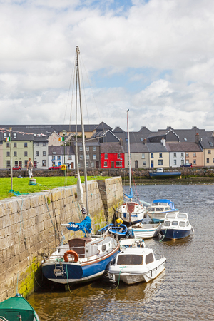 GALWAY, IRELAND - AUGUST 18, 2012: A view from the Claddagh, across the River Corrib,  towards The Long Walk in Galway, Ireland.のeditorial素材