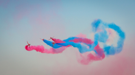 DUBAI, UAE - NOVEMBER 11, 2007: The  Red Arrows aerobatic team of the Royal Air Force flying over Dubai in BAE Hawk aircraft.のeditorial素材
