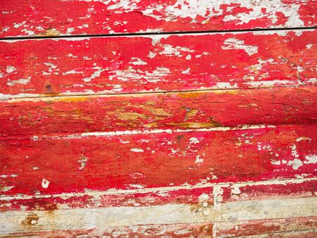 Background abstract texture of the red hull of a wooden fishing boat in Clew Bay, Ireland.の写真素材