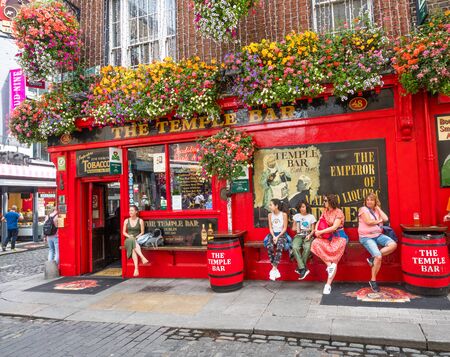 DUBLIN, IRELAND - AUGUST 1, 2019: Established in 1840, the Temple Bar in Dublin is Ireland's most popular tourist bar. It has the largest collection of rare whiskeys in the country.のeditorial素材
