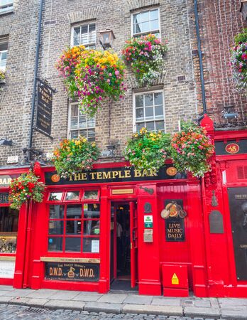 DUBLIN, IRELAND - AUGUST 1, 2019: Established in 1840, the Temple Bar in Dublin is Ireland's most popular tourist bar. It has the largest collection of rare whiskeys in the country.のeditorial素材
