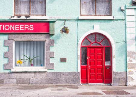 HEADFORD, IRELAND - AUGUST 6, 2019: A colorful office situated in an old building in Main Street in Headford in County Galway, Ireland.のeditorial素材