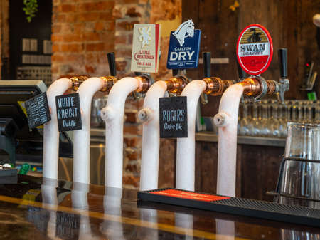 GUILDFORD, AUSTRALIA - AUGUST 23, 2020: Taps for Australian draught beers in the pub at the Guildford Hotel in Perth, Western Australia.のeditorial素材