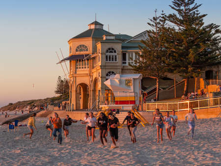 PERTH, AUSTRALIA - MARCH 27, 2021: Unidentified girls enjoying themselves during the golden hour at...