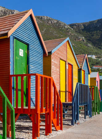 Brightly painted wooden bathing huts at St James Beach, near Cape Town, South Africa.の写真素材
