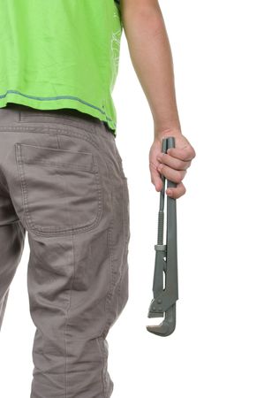 Tenager holds a trumpet key on a white backgroundの写真素材