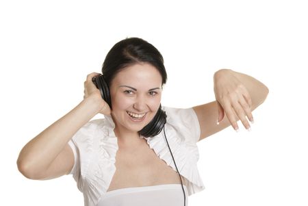 Happy young woman with ear-phones isolated in whiteの写真素材