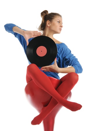 Young woman with vinyl recordの写真素材