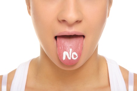 Woman puts out the tongue with an inscription noの写真素材