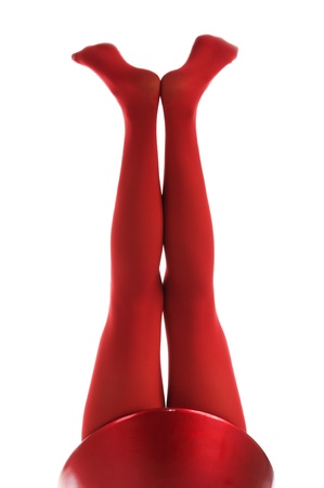 Female feet in red stockingsの写真素材