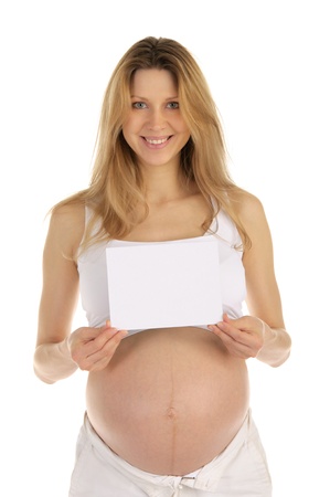 happy pregnant woman with a blank formの写真素材