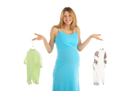 pregnant woman buying baby clothesの写真素材