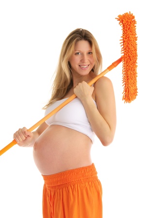 happy pregnant woman with a mop and brushの写真素材