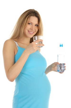 pregnant woman drinks waterの写真素材