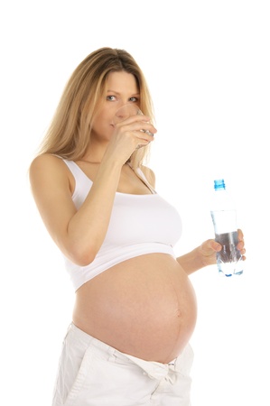 pregnant woman drinks waterの写真素材
