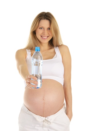pregnant woman holds out  bottle of waterの写真素材