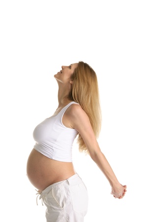 Pregnant woman practicing yogaの写真素材