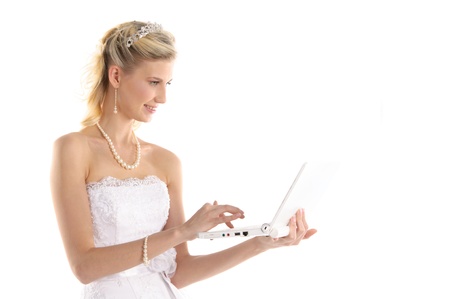 happy bride with laptopの写真素材