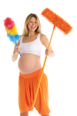 happy pregnant woman with a mop and brushの写真素材
