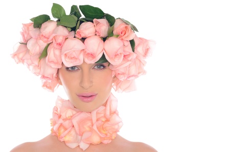 beautiful woman with jewelry of pink rosesの写真素材