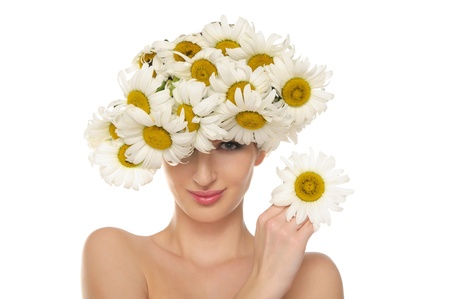 beautiful woman in the hat of daisiesの写真素材