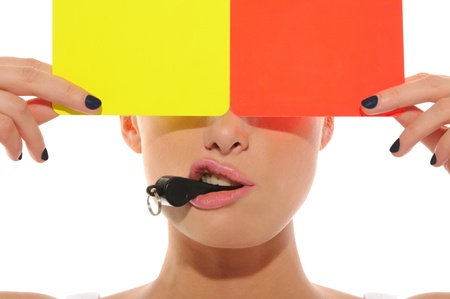 beautiful woman with whistle, yellow and redの写真素材