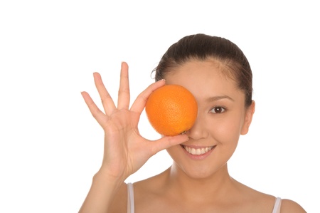 happy asian woman with orangeの写真素材
