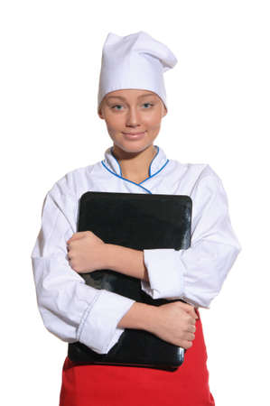 happy woman-cook with laptop isolated on whiteの写真素材