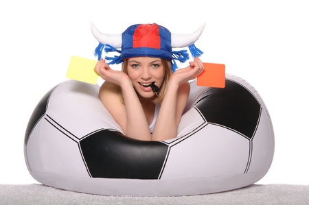 Happy football supporter with red and yellow cardsの写真素材