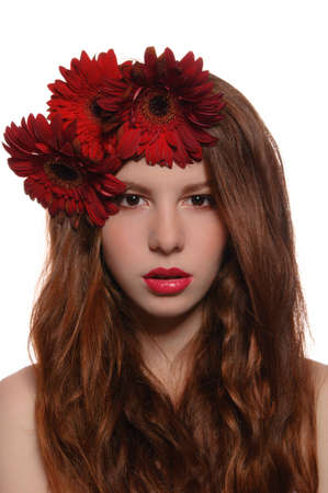 Redhead girl with flowers in their hairの写真素材