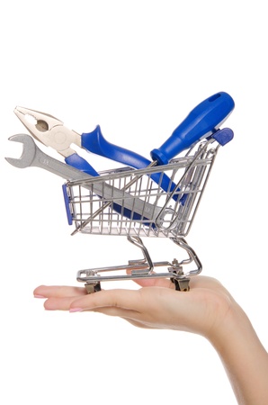 tools in shopping trolley on the palmの写真素材