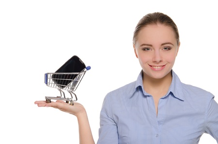 smartphone in shopping trolley on the women palmの写真素材
