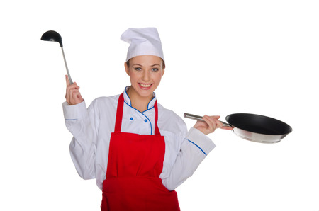 Smiling chef with ladle and pan isolated on white