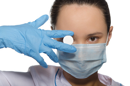 Doctor closed his eyes pills isolated on whiteの写真素材