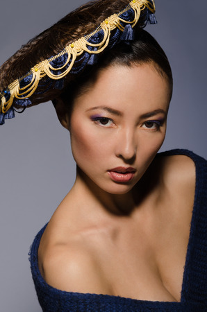 Beautiful asian fringed hair isolated on grayの写真素材