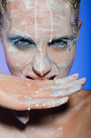 Vertical portrait of woman with face paintの写真素材