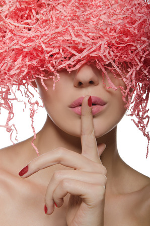 Vertical portrait of young woman with pink hairの写真素材