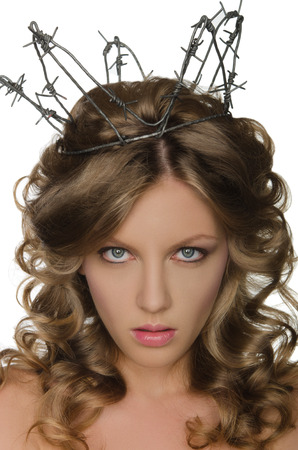 Beautiful young woman wearing crown of barbed wireの写真素材