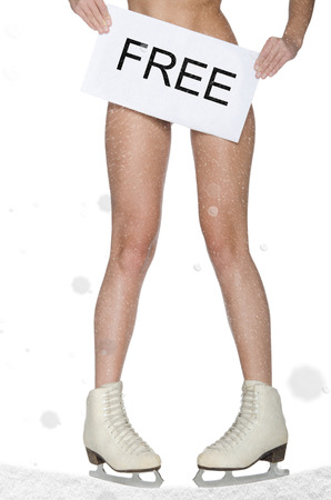 Beautiful female feet in the skates and the inscription free on the plateの写真素材